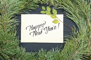 wreath with happy new year sign