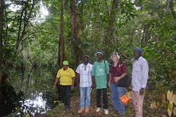 Bill with farmers in Guyana