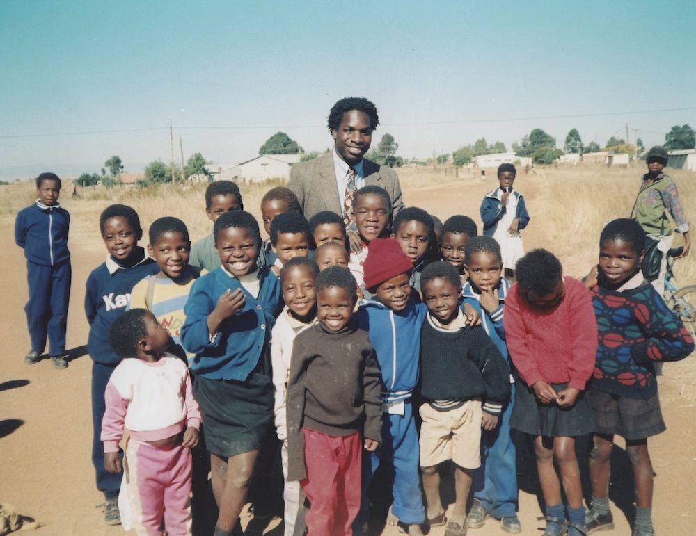 Volunteer C.D. Glin with his students in South Africa, 1997
